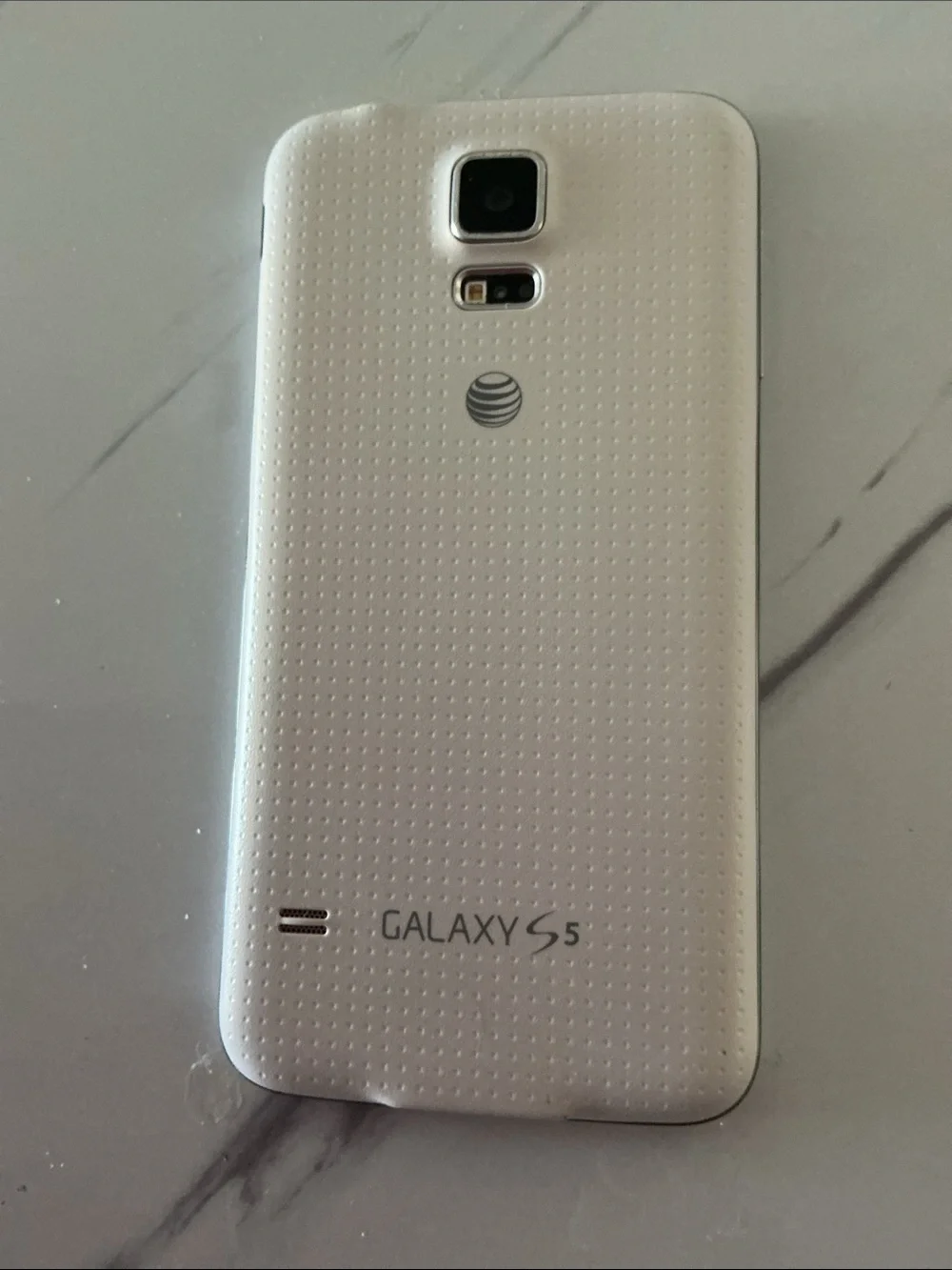 Samsung Galaxy S5 White Cell with 2 Cases Included. Barely used.